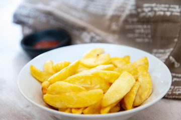 Golden French fries potatoes ready to be eaten