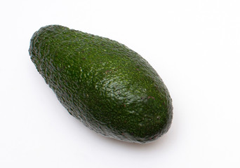 one ripe avocado close-up on a white background