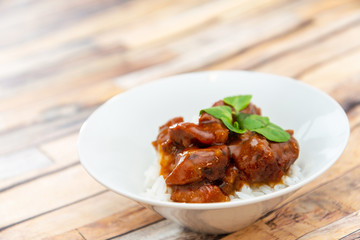 Asian style caramel pork with rice and vegetable