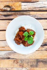 Asian style caramel pork with rice and vegetable