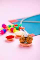 Indian festival makar sankranti concept, Sesame seed ball or til ke laddo, tilgul and Kite String 