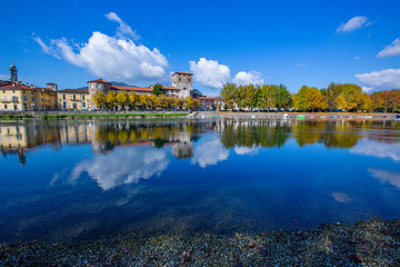 Brivio landscape reflected on the Adda river with the bridge