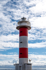 Faro de Fuelcaliente, red-white lighthouse tower on south of La Palma siland, Canary, Spain