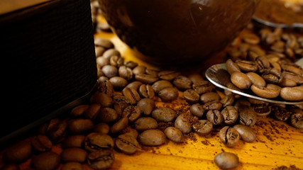 Coffee Latte with coffee beans scattered on the table