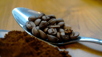 Coffee Latte with coffee beans scattered on the table