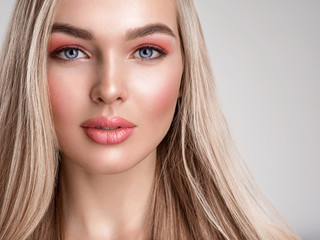 Portrait of a blonde beautiful woman with a long straight light hair. Portrait of a beautiful woman...