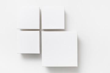 Mock up of four different size white boxes on the white background
