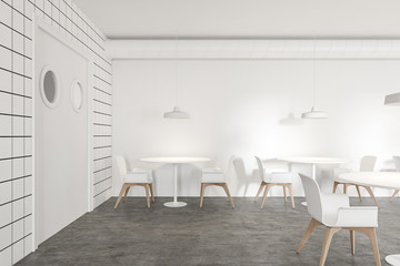 Fototapeta premium Comfortable restaurant interior with round tables