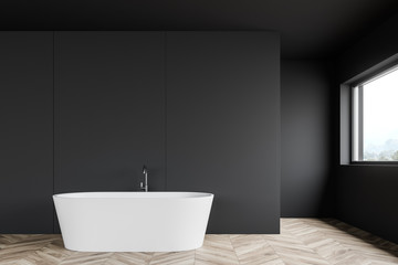 Fototapeta na wymiar Loft gray bathroom interior with tub