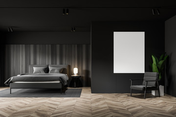 Gray and wooden bedroom with poster