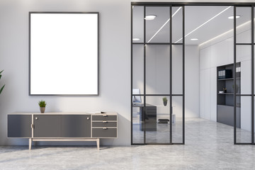 White living room interior with cabinet and poster
