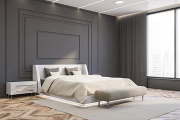 Fototapeta na wymiar Panoramic gray master bedroom corner