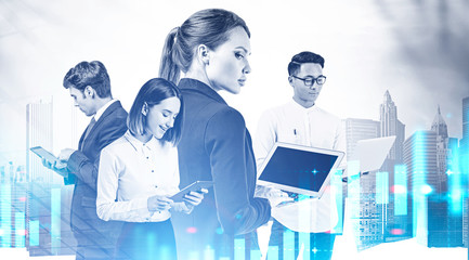 Diverse business partners in city, financial graph