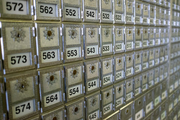Numbered vintage mail boxes in a Post Office