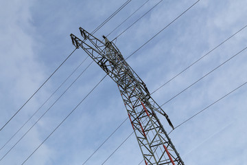 Transmission line on background of blue sky