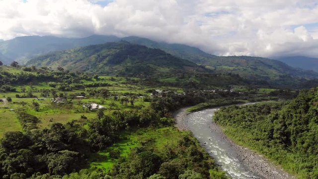 View above the Rio Quijos Valley, a tributary of the Amazon in Ecuador, view downstream showing the Baeza-Lago Agrio road and areas cleared for cattle pasture.