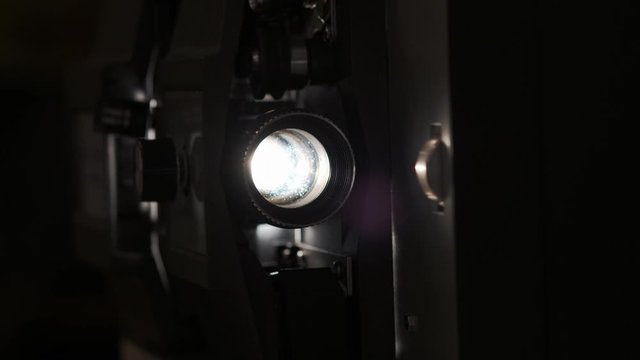 8mm Vintage Projector Lens with Light On. 4K