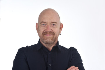 portrait  of bald man on white, smiling