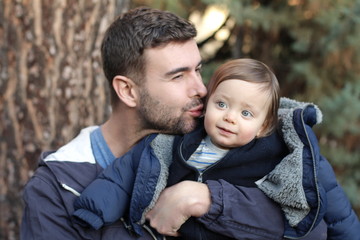 Handsome father with his one year old baby
