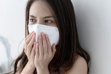 Woman wearing face mask  for Prevent  New coronavirus 2019-nCoV from China