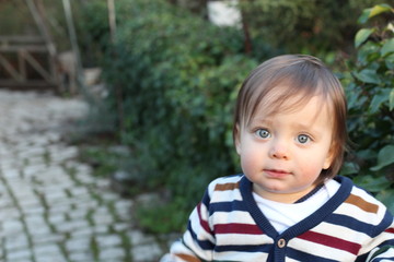 Cute baby outside with copy space 