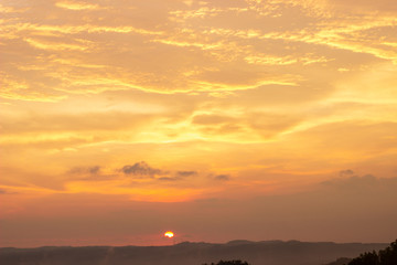 The sunset on Purba Volcano Mountain,Mount Api Purba. one of the tourist destination in Gunungkidul, Yogyakarta, Indonesia.