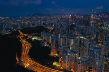Naklejka premium Aerial view of Hong Kong City at twilight time.