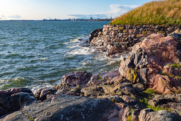 Helsinki. Finland. Baltic sea coast. Gulf of Finland. Rocky shore and stones of the old fortress...