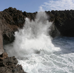 Fototapeta premium Lanzarote. High waves splashing the coast.