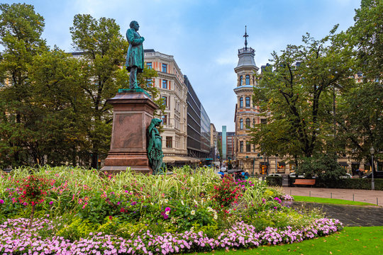Helsinki. Finland. Streets Of Helsinki. Monuments Of Helsinki. The Statue Of Johan Ludwig Runeberg. Runeberg monument on the background of a flower bed. Autumn trip to Finland.