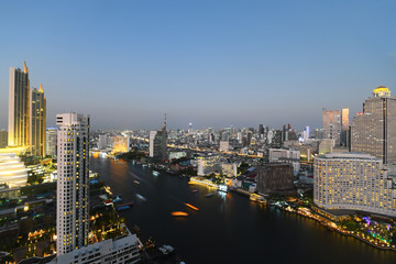 Bangkok city skyscraper with famous landmark at dusk.