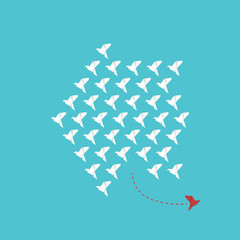 Obraz premium Think differently - One red unique different paper bird flying opposite way of identical white ones.&nbsp;
