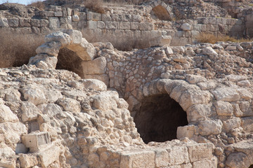 Old Roman ruins in Israel with an arched doorway