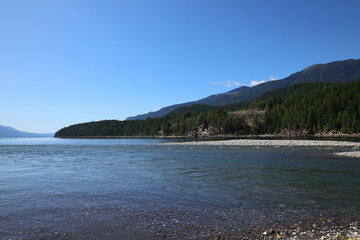 Fototapeta na wymiar Lake, Mountain lake, alpine meadows and rocky summits in the Rocky Mountains in Canada, British Columbia, West coast