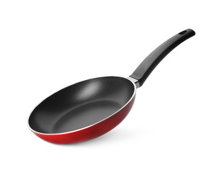 Modern red frying pan isolated on white