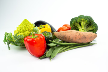 Composition With Vegetables Isolated On White.Healthy food concept.Copy space