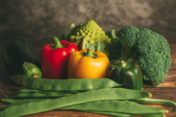 Vegetables from organic farming on a wooden background. Healthy food concept.Copy space