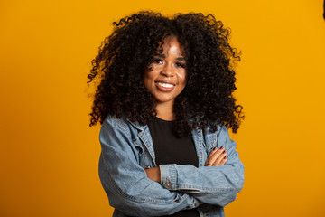 Business black woman on a yellow background