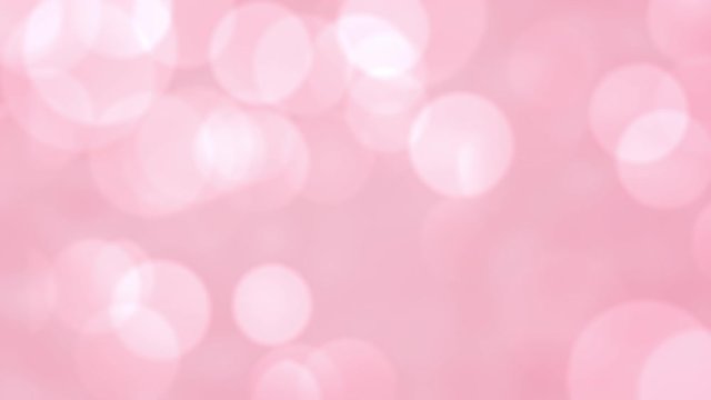 Beautiful romantic pink bokeh blur abstract light particles background. Valentines day background greeting card. Happy Valentine's Day resolution concept.