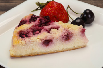 Cheesecake with cherry served strawberry