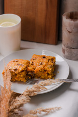 carrot cake with nuts and lemon tea