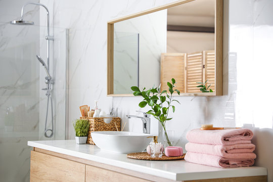 Large Mirror Over Vessel Sink In Modern Bathroom