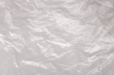 Background texture of a polyethylene transparent film on a white background