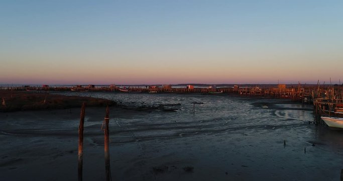 Aerial view of the traditional palafitic pier at the Carrasqueira Village in Comporta, Portugal