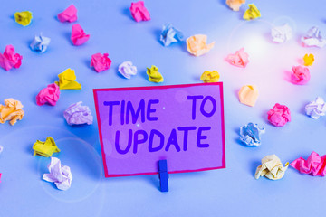 Conceptual hand writing showing Time To Update. Concept meaning The latest information about a...