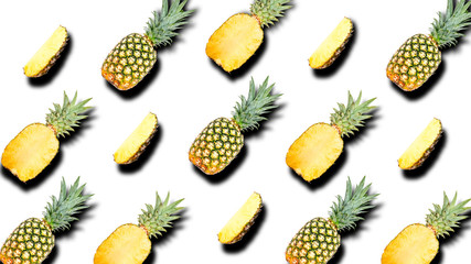 Creative background of fruit whole and slice pineapples with shadows isolated on white. Clipping Path.