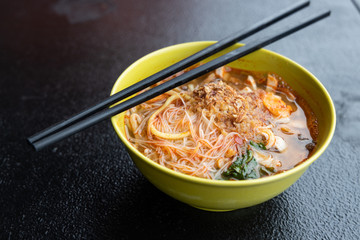 Bowl of Penang prawn mee, popular noodle in Malaysia