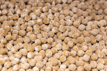 Heap of raw tapioca boba pearls freshly prepared before cooking.