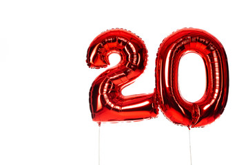 number 20 red balloons isolated on white