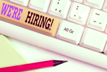 Word writing text We Re Hiring. Business photo showcasing recently employ someone or pay someone to...